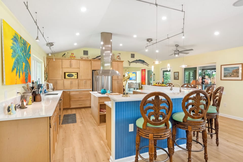 Chef's gourmet kitchen. Open floor  plan. Fully stocked. Drink fridge