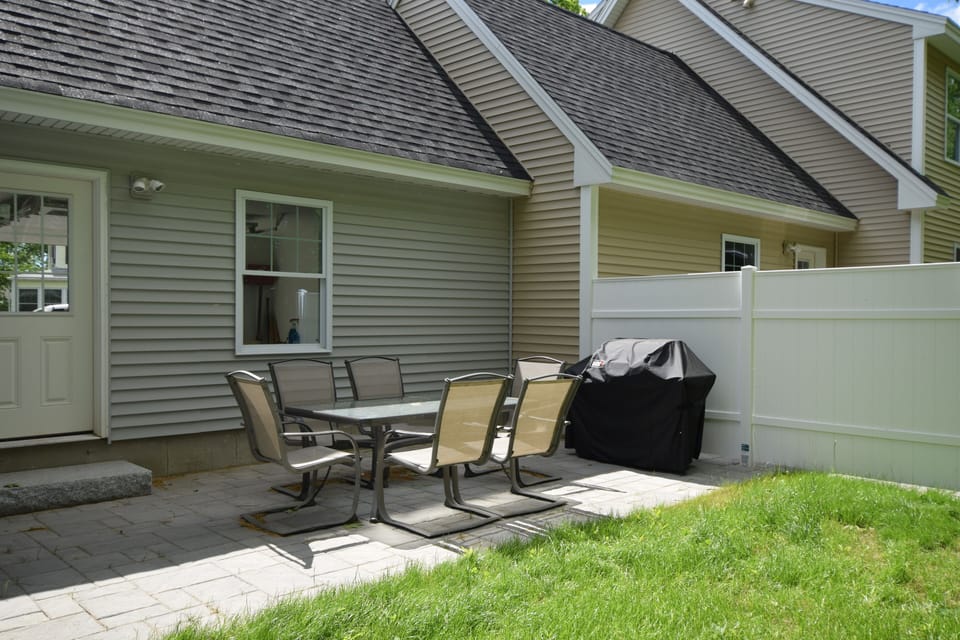 Private patio with gas grill.  Perfect for barbecue. Extra chairs in Garage.