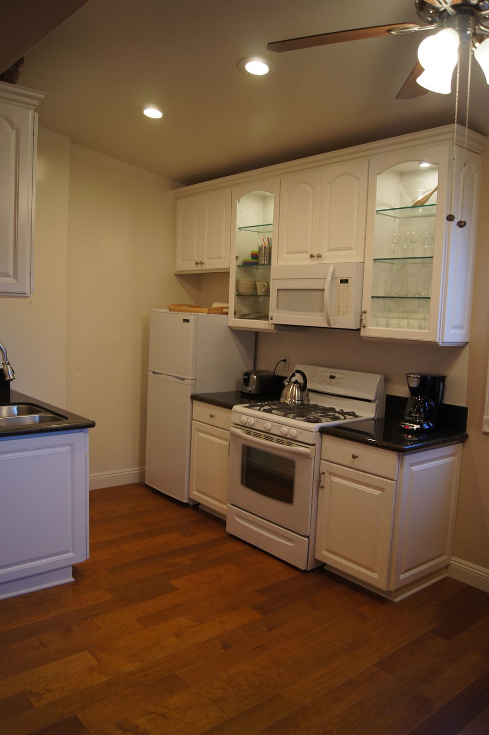 Kitchen and Living areas Feature Cathedral Ceilings.