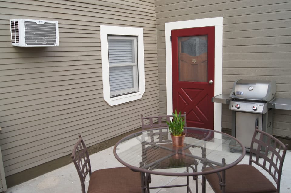 This unit Features its own private patio with Table/Chairs.