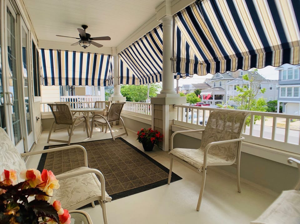 Front deck with awnings and ceiling fans