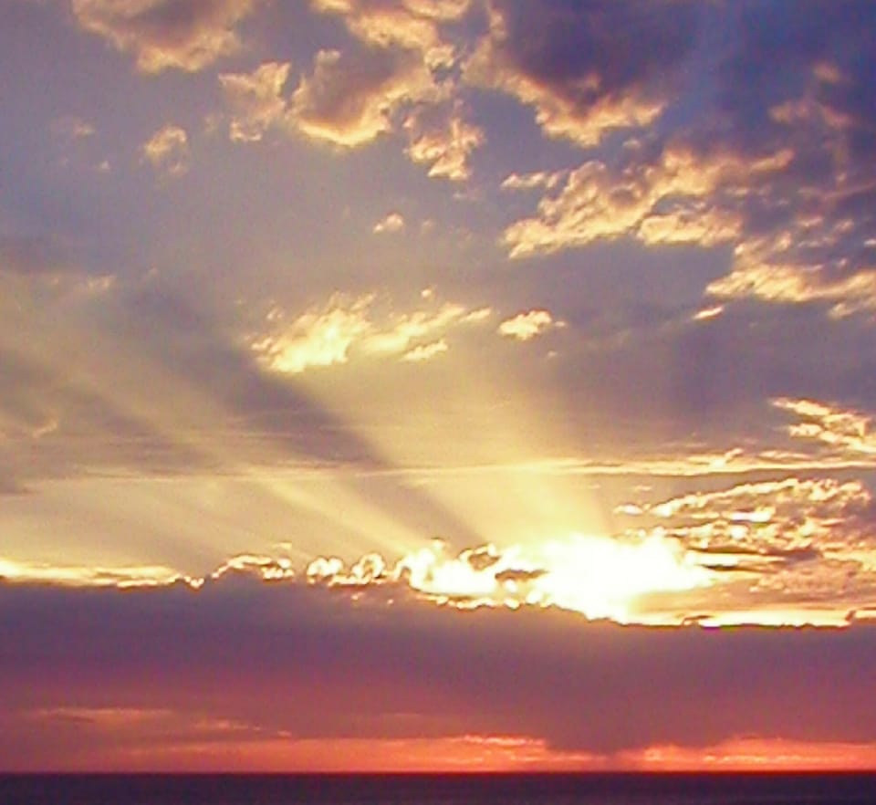 Magnificent sunset photo taken at your home away from home at the beach