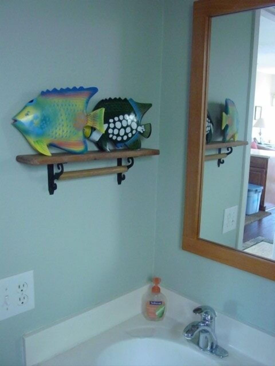 Clean bathrooms that provide home privacy and beach friendly fixtures and decor.