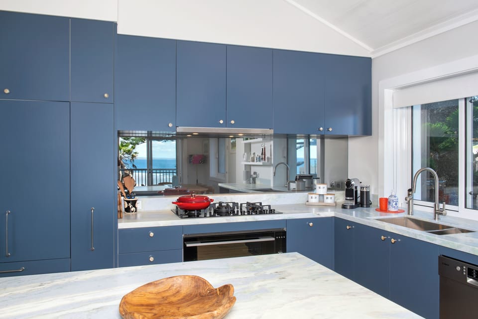 Kitchen: marble bench, 5 burner stove, Bosch dishwasher, zip, nespresso,  views