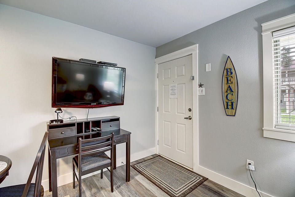 Living room with full size Murphy bed - Integrated living space
