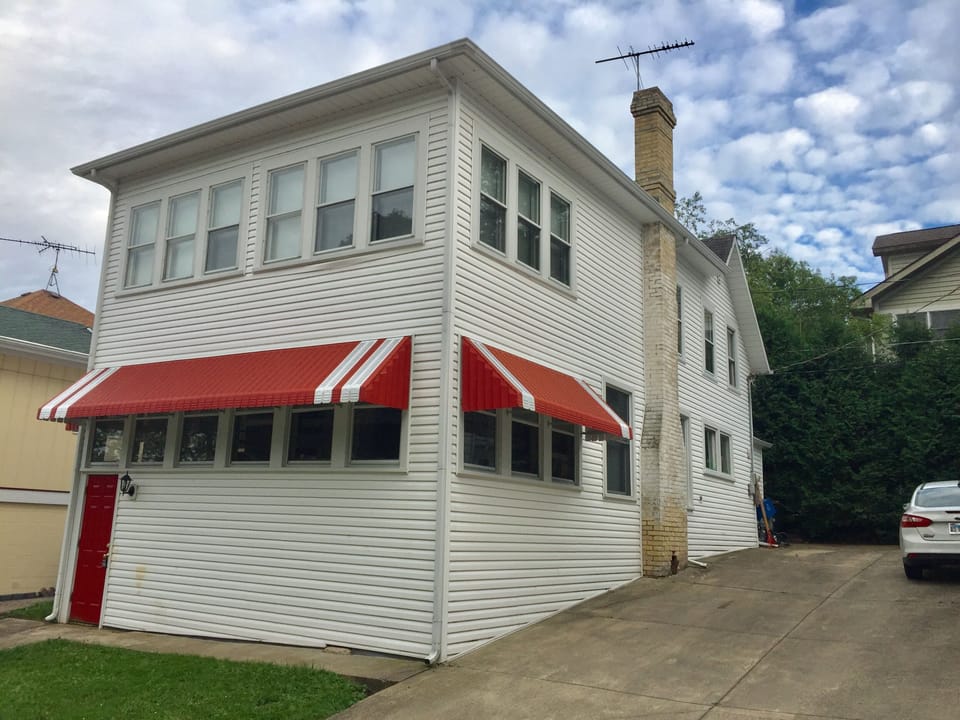 distinct cottage with large driveway