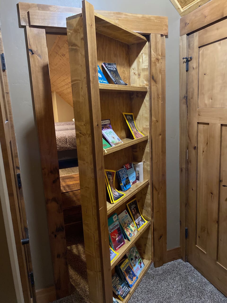 Secret door in "Harry's Hollow" leading to bonus room " Camp Hunt"