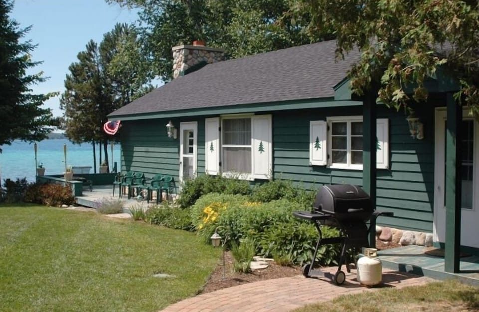 Nicely landscaped grounds and attractive cottage for your enjoyment!