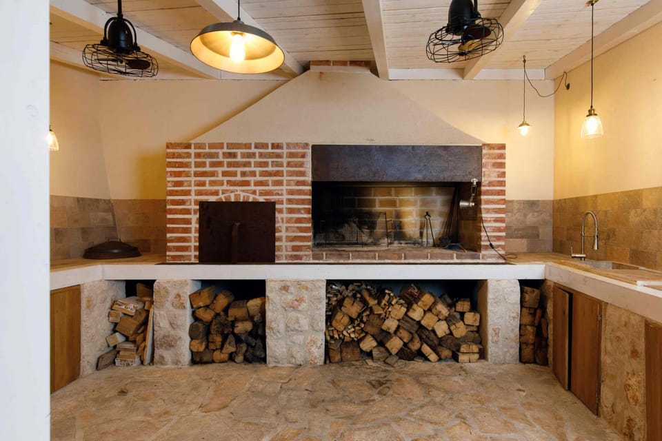 fireplace and stove in the summer kitchen