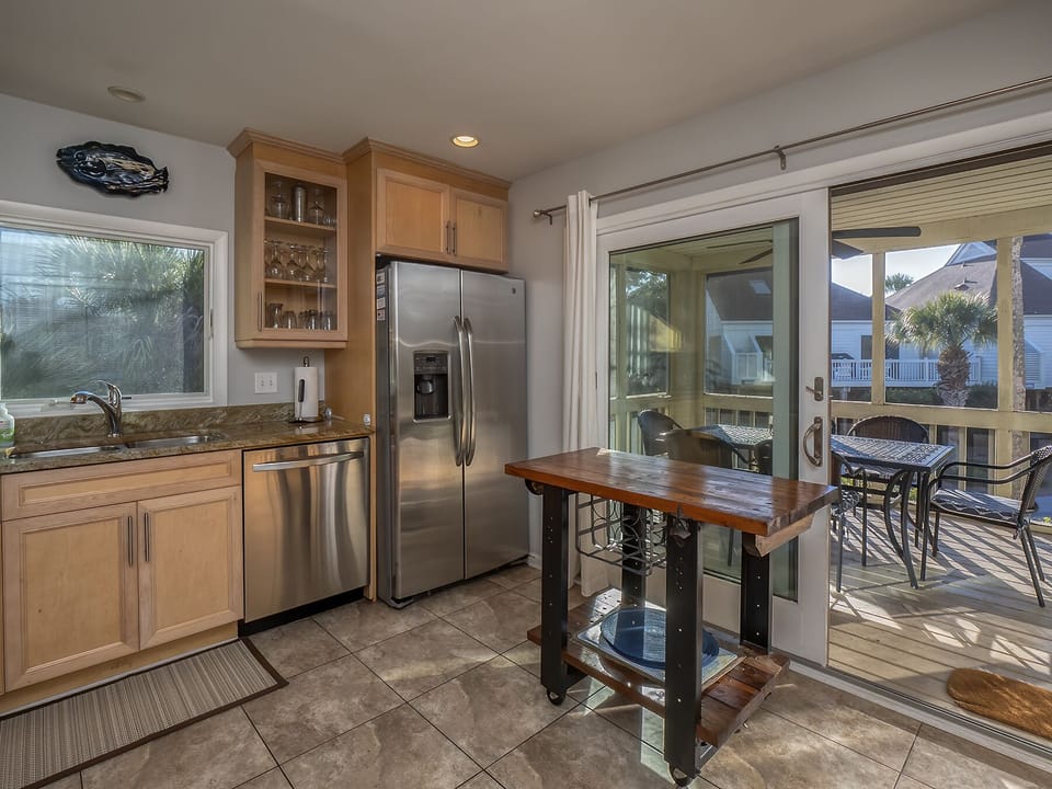 Screened in porch off the kitchen.  Enjoy outside dining if you would like.