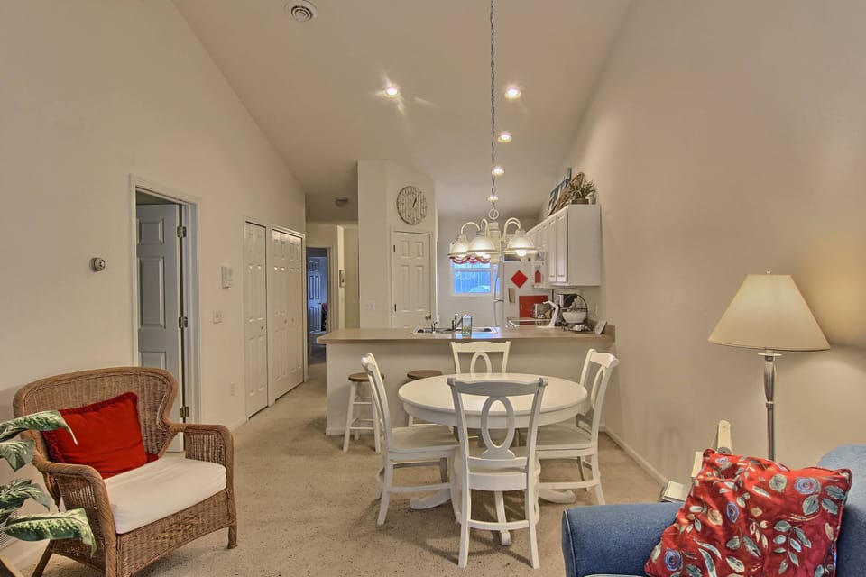 view of the dining room and kitchen from the living room