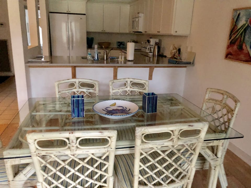 Kitchen opens to dining area