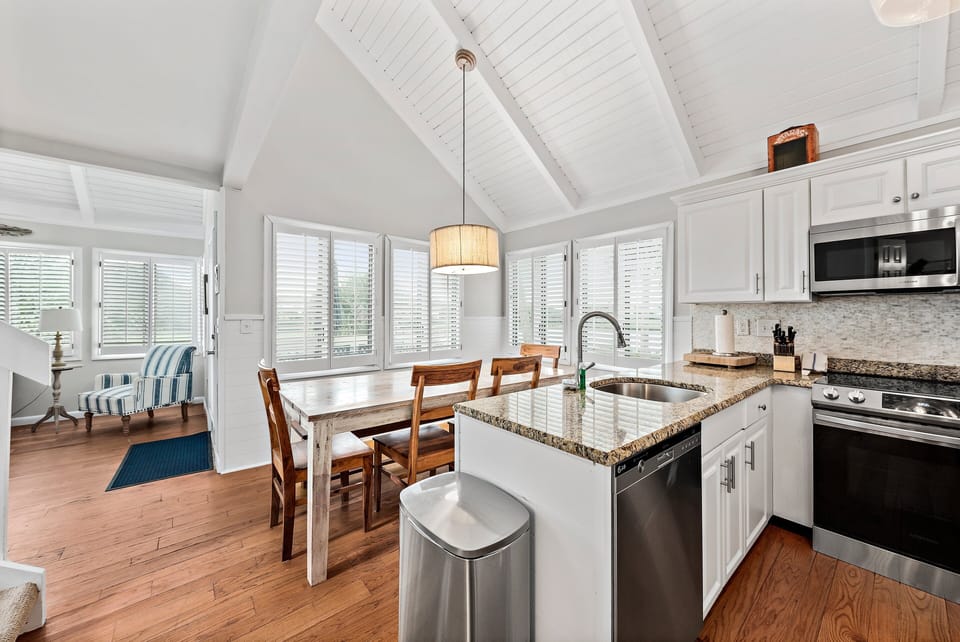 Beautiful granite counter tops in the open concept kitchen.