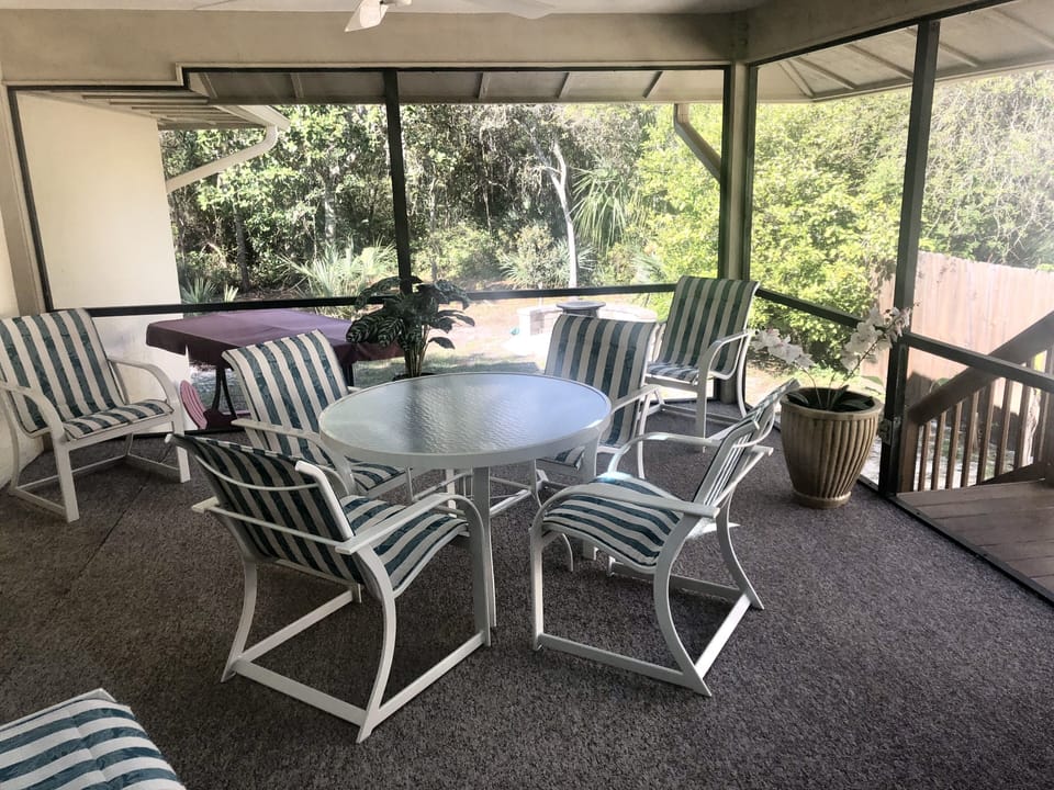 Screened in patio for relaxing.