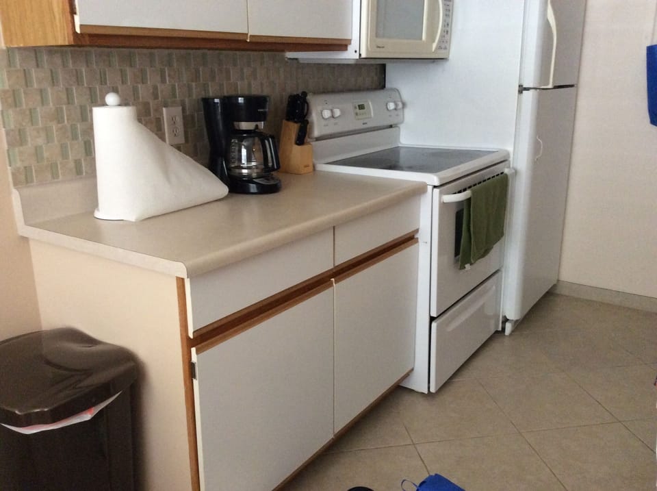 Kitchen has all the baking needs for cooking in 