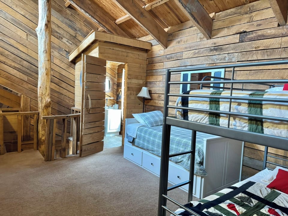 Loft area with 1 Bunk Bed set + Twin with trundle