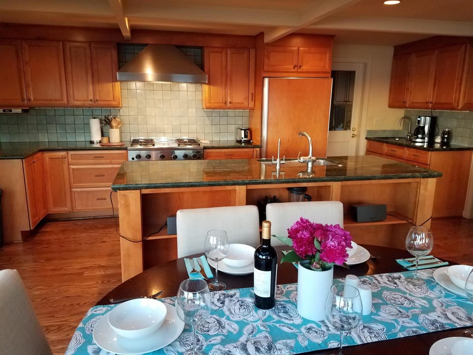 The spacious, open-plan kitchen opens into the dining room