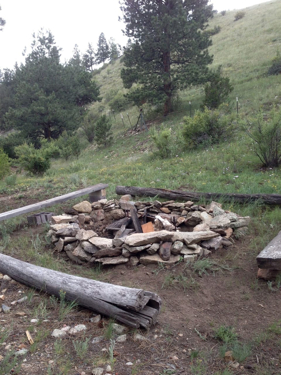 The outdoor fire pit is right next to the creek 