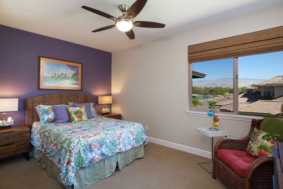 Bedroom with Large Bed, Nightstands, and Armchair