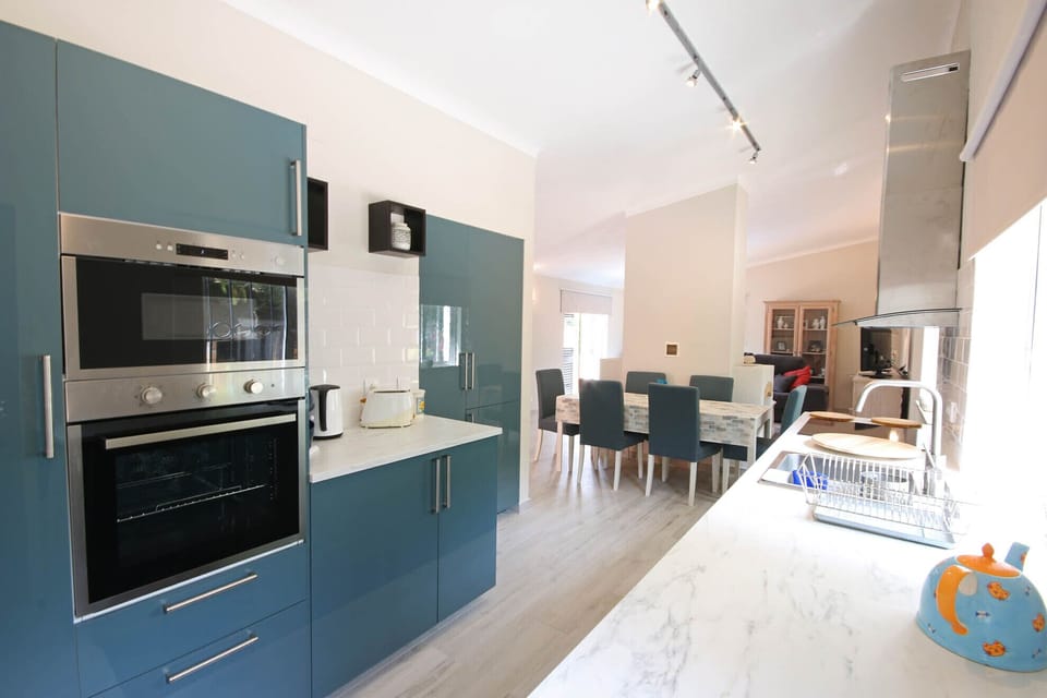Modern fully fitted kitchen with built in electrical appliances