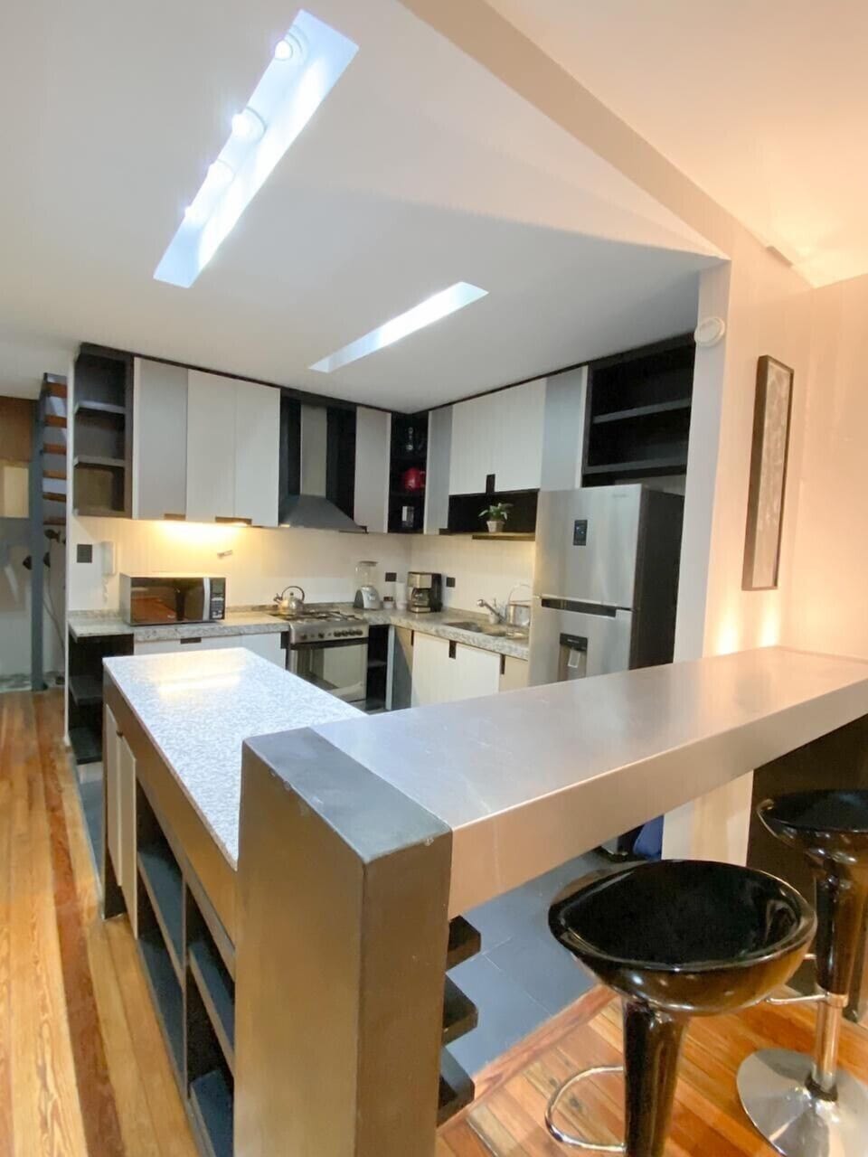 Our kitchen is fully stocked for all your needs and bar counter to enjoy a cafe