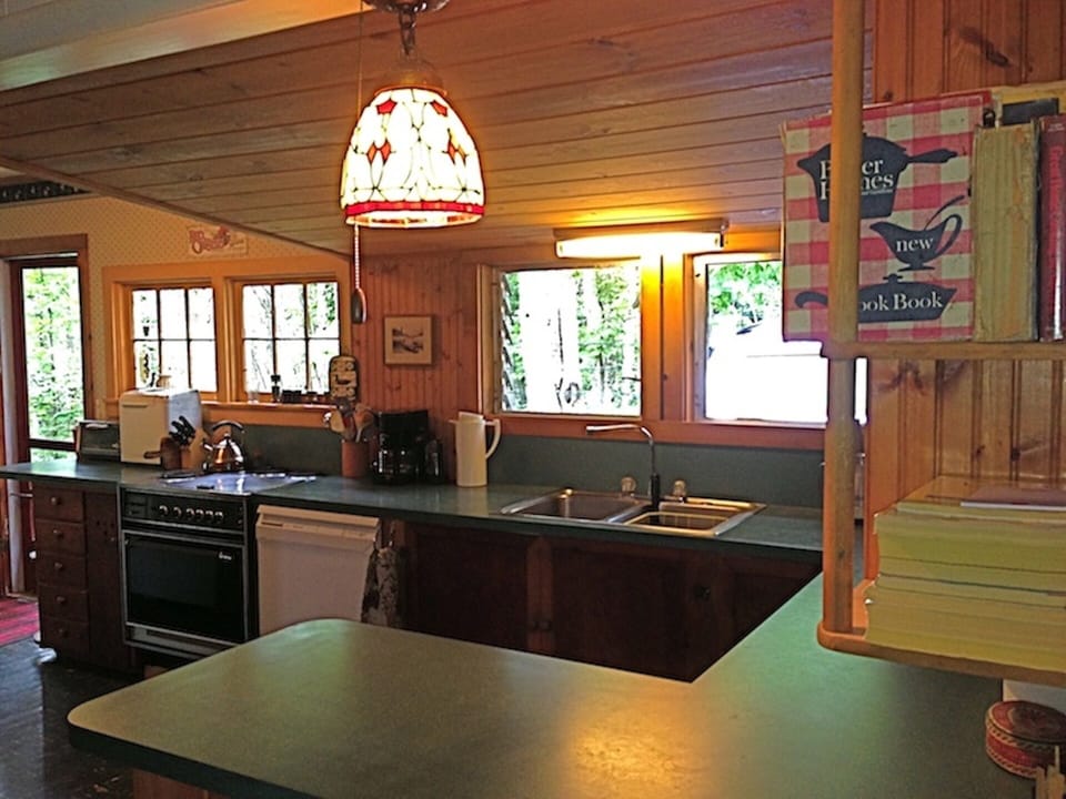 Kitchen.  Dishwasher, ovens and stovetop. Microwave, large frig, and more.