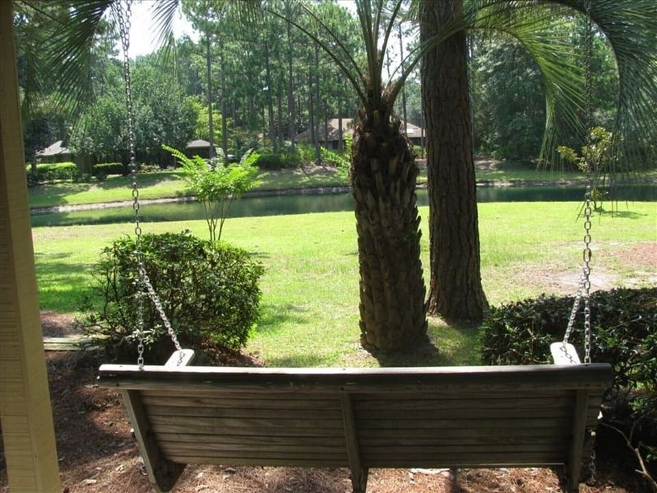 This covered porch swing is a fun place to relax.