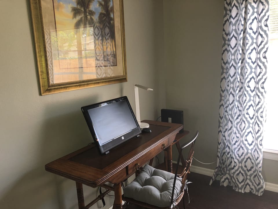 Within the dining room, you will find an office space for your convenience.