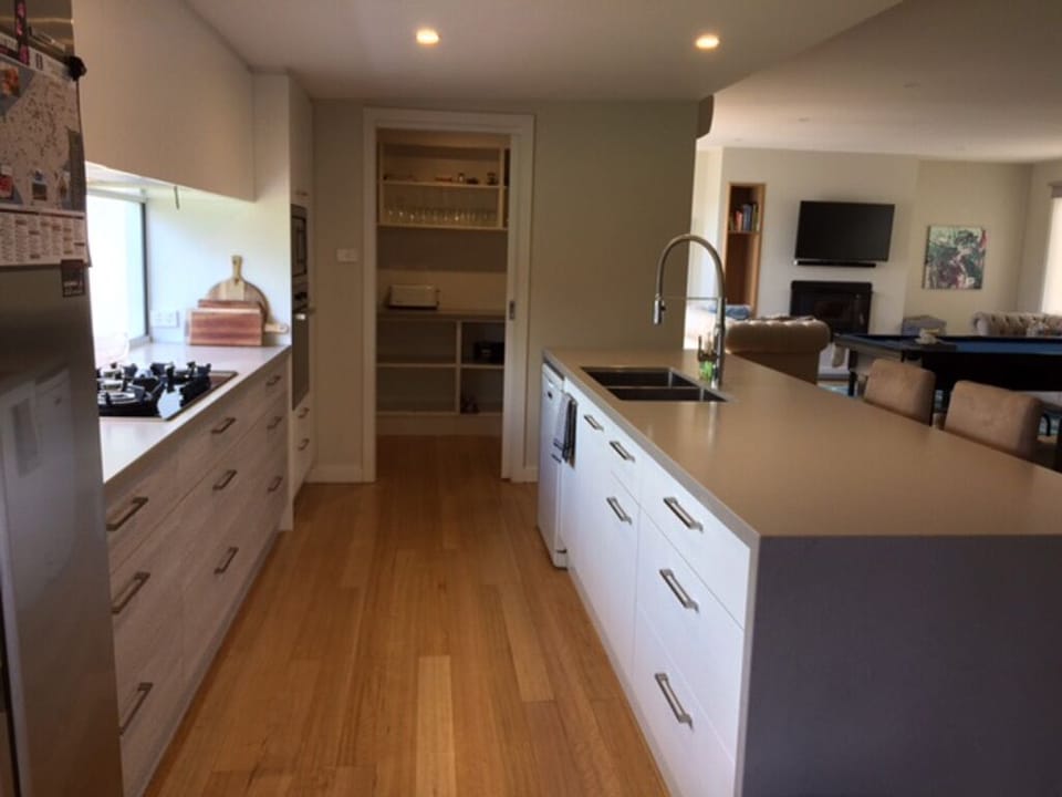 Amazing kitchen, stone bench tops, walk in pantry.