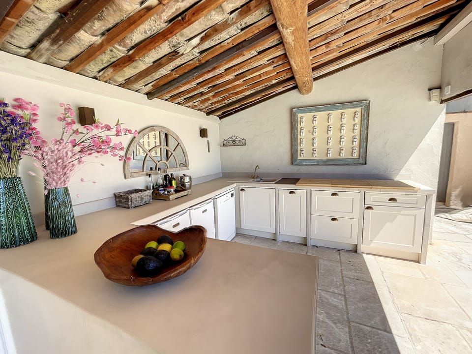 The renewed pool-house kitchen