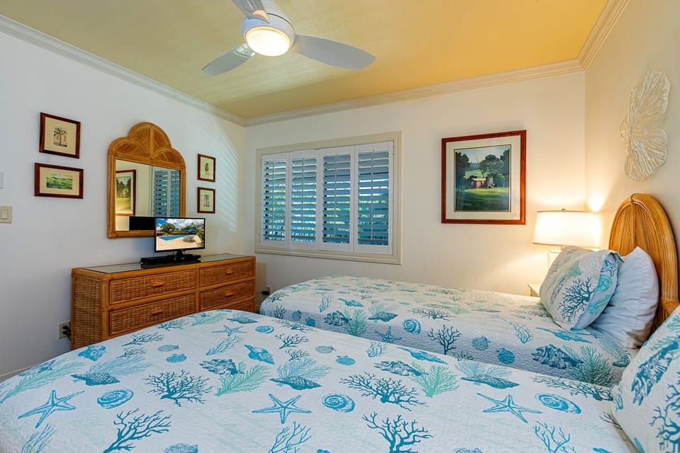 Guest bedroom has two twin beds that can convert to a king!