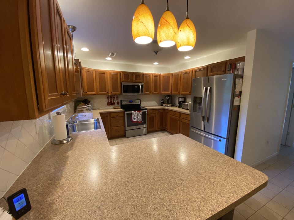 Kitchen - electric stove,  tea warmer , drip and Keurig coffee maker, toaster 