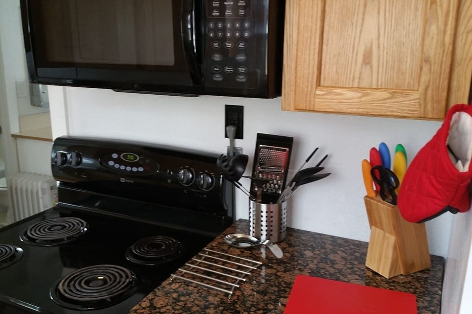 Fully Equipped kitchen includes Cookware & Bakeware + Dishes and Silverware. Microwave, wide mouth toaster and coffee machine just brought in for your convenience as well.