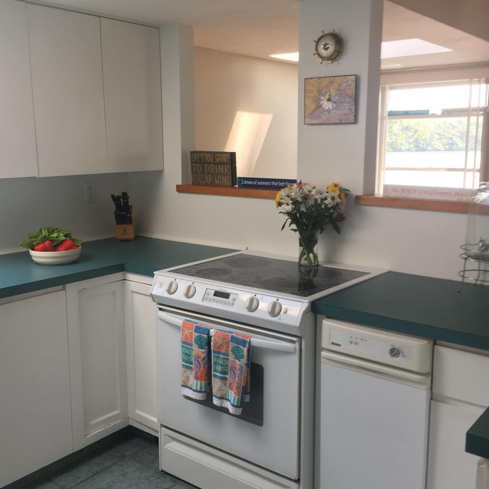 Cook over the stove while taking in the waterview