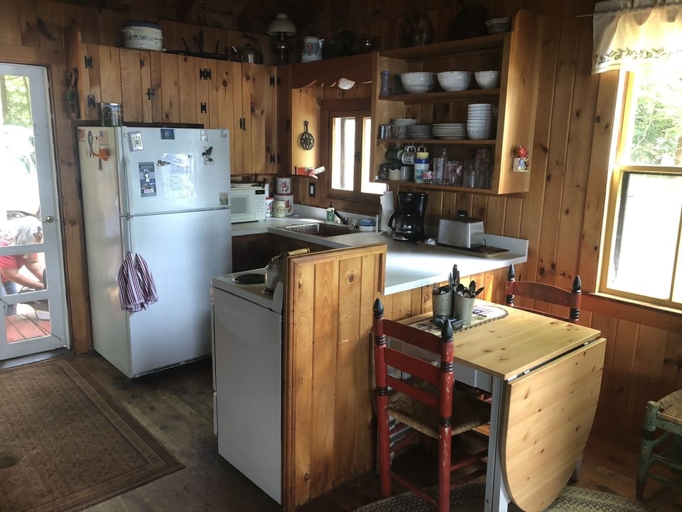 Kitchen and inside eating area.  Table can be extended for 6
