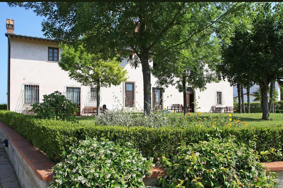 Just in front of the building there is a nice garden area with tables and chairs