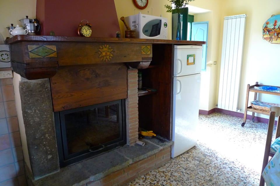 Kitchen log burning fireplace