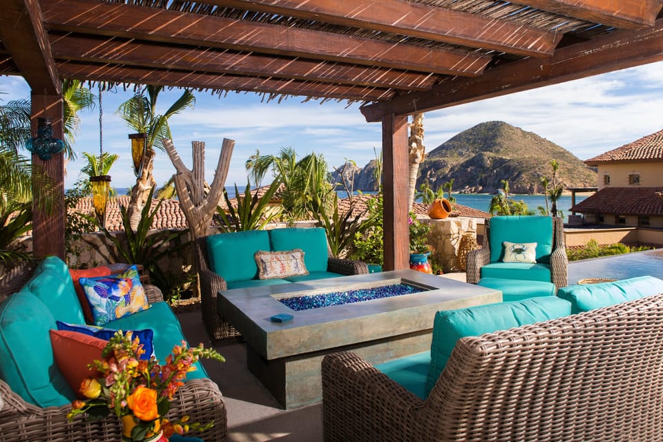 Outdoor seating area with fire pit and gorgeous ocean views