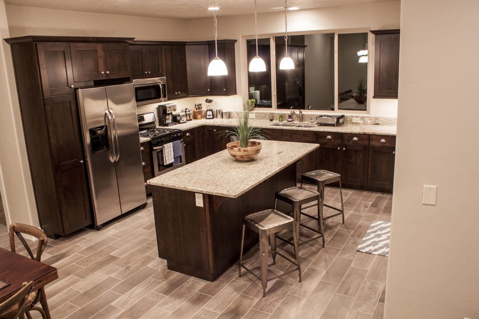 Stay in or go out! Stocked gourmet kitchen; large gathering island