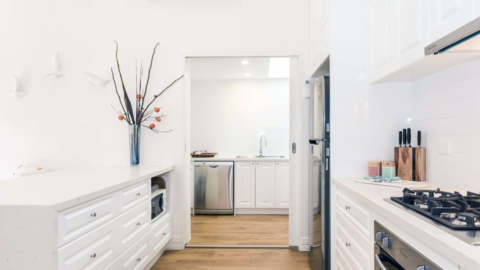 Fully equipped kitchen with dishwasher and all appliances and utensils 