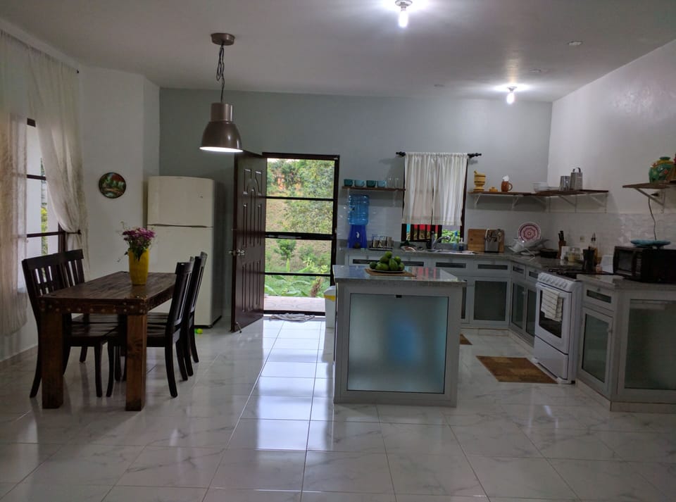 Kitchen with rustic dining room table for 4 people.