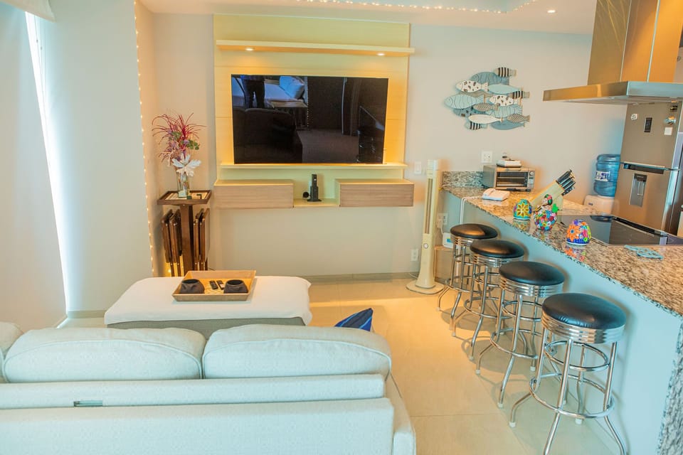 OPEN CONCEPT. Living room and kitchen  in view. Cook with ocean view.
