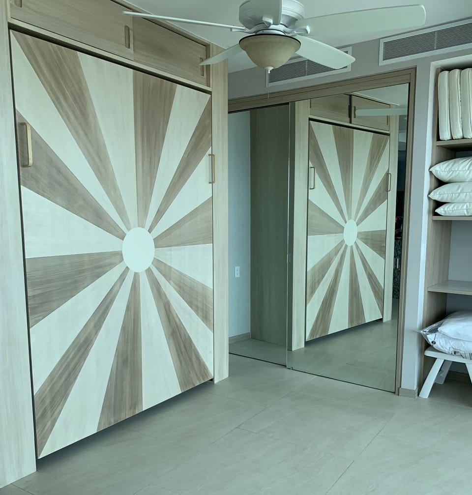 This beautiful cabinet holds a  bed fit for King and Queen