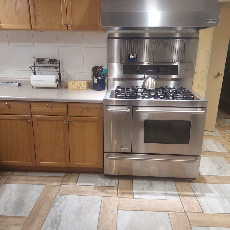 Full size range/oven for your cooking and baking delight.