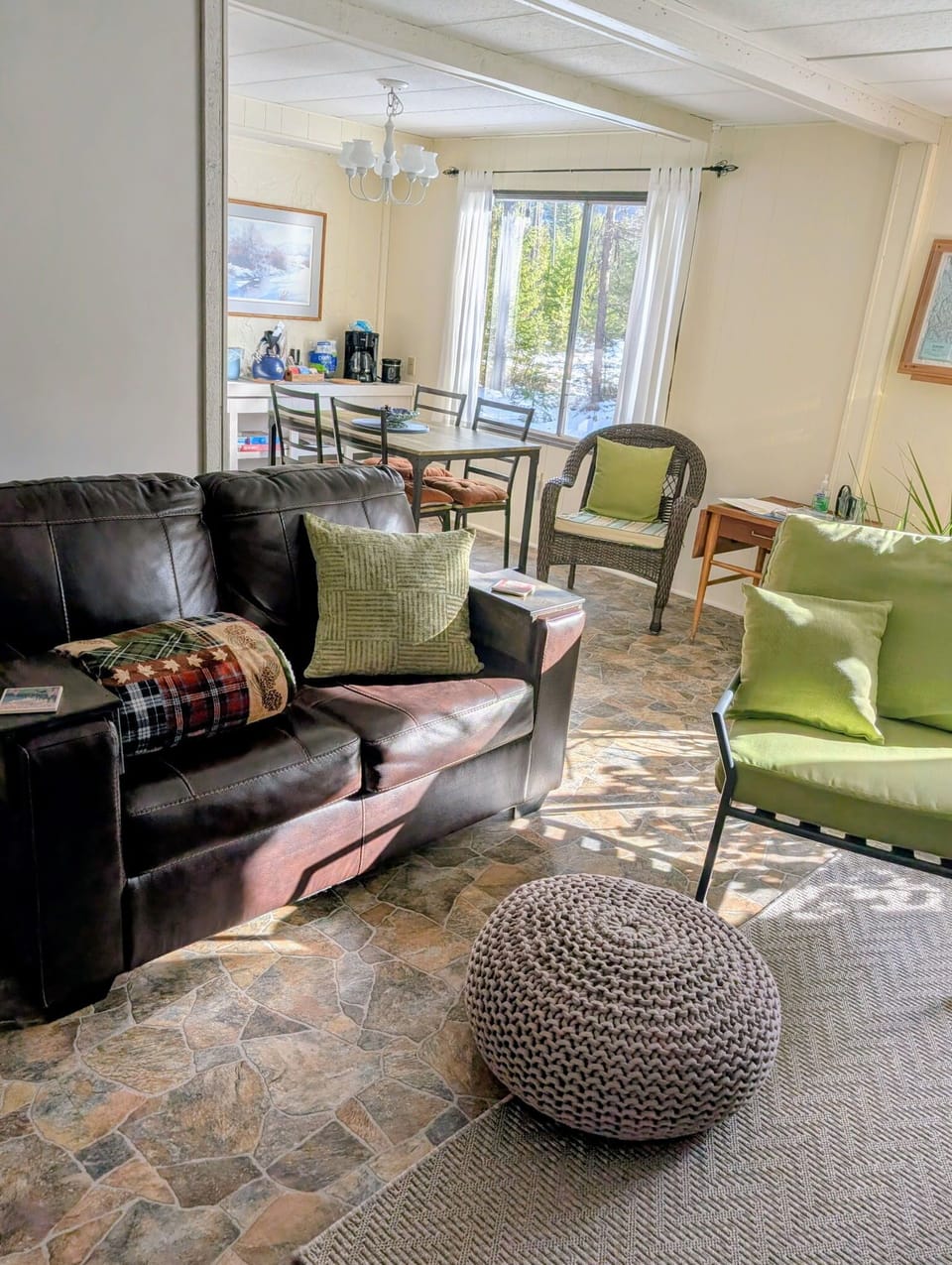 Comfortable Living Room with view to Dining Room table.