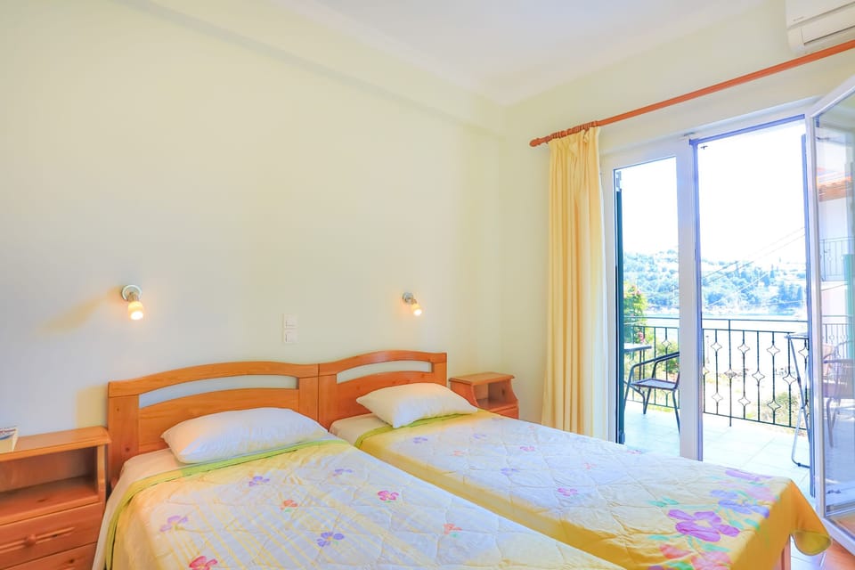Twin bedroom 2 with countryside %26amp%3B sea views