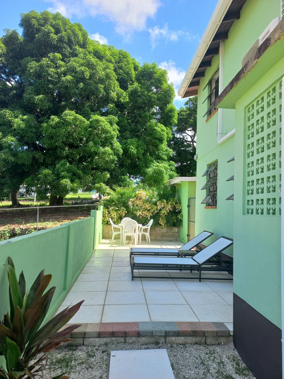 Guest's personal stone deck is ideal  for outdoor living and relaxation 