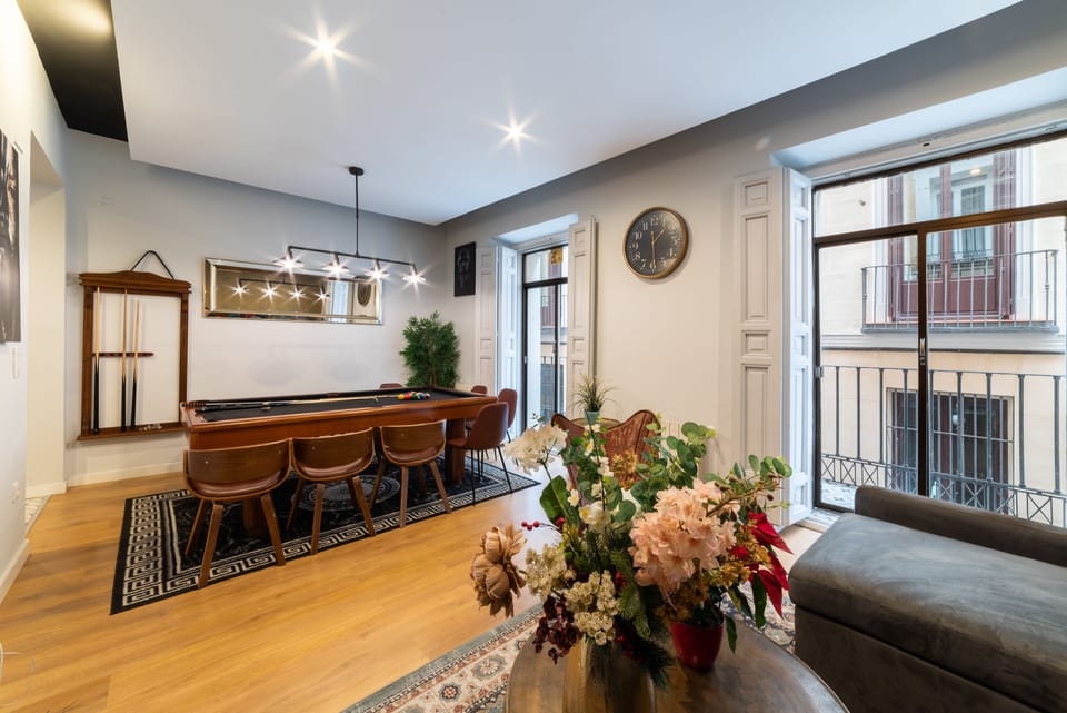 Living room & dining table with 2 balconies- view from the left- Plaza Tirso 