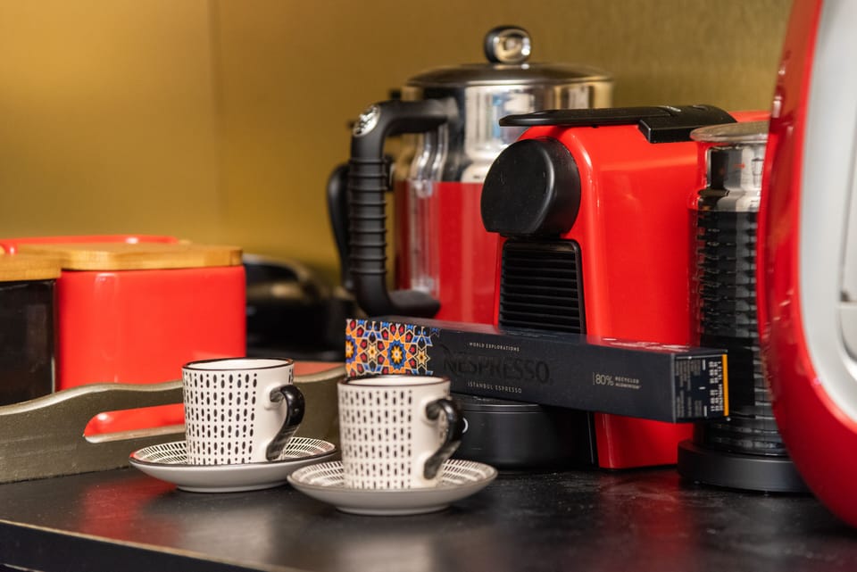 Nespresso, foam milk maker, package of capsules
