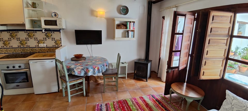 Under floor central heating with an additional wood burning stove if necessary.